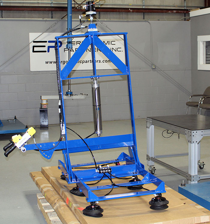 Grip and Rotate Vacuum Lifter for Flexible Boxes